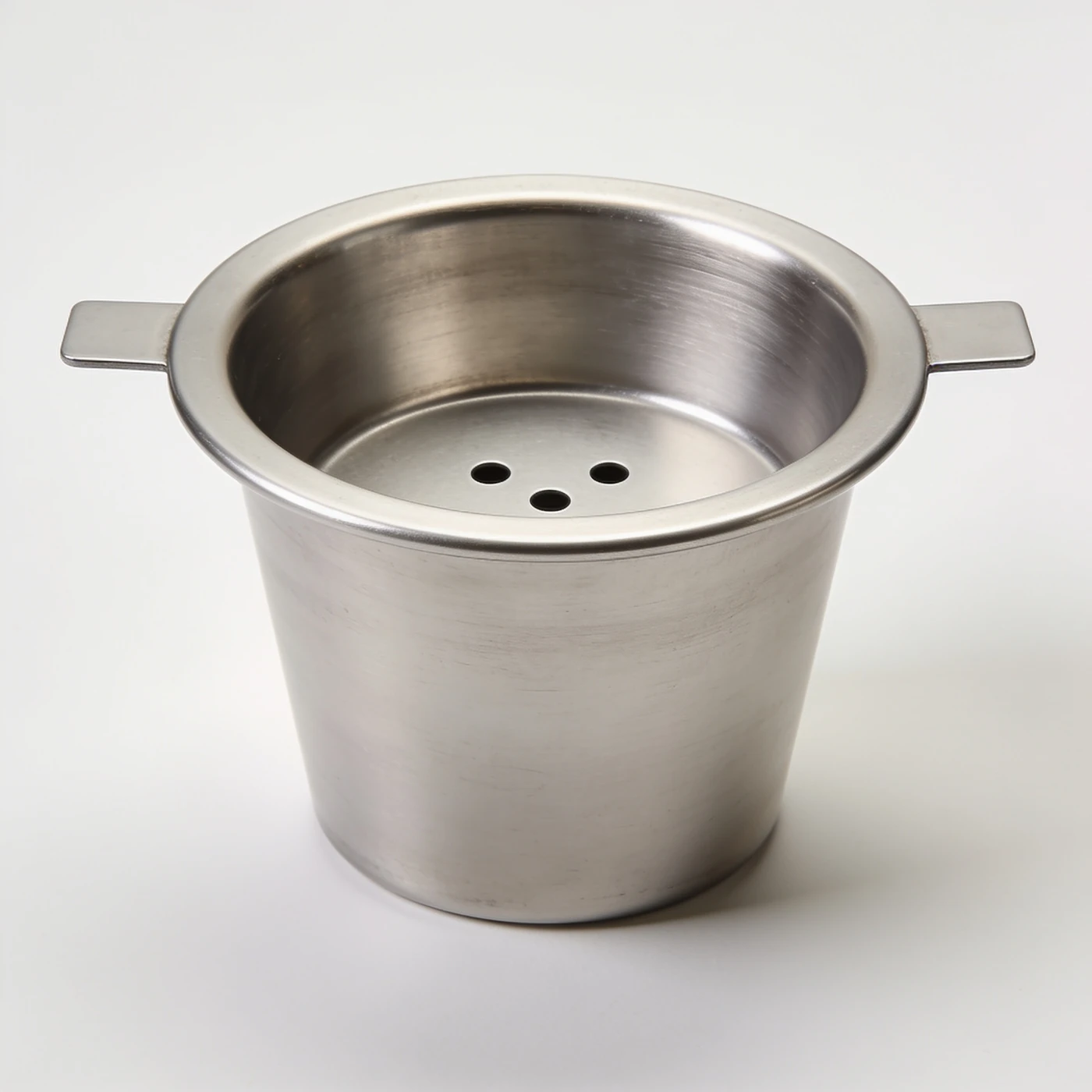 Bed Flat Dripper — brushed stainless steel flat-bottom basket; three drain holes and two support ears