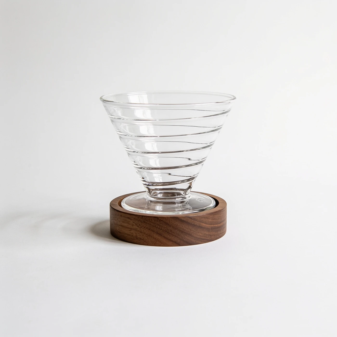 Clear Ring Dripper — clear borosilicate glass cone; spiral ribs and removable walnut support ring